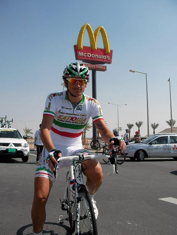 Filippo Pozzato (Katusha) shows his moustache under the golden arches.