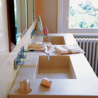 wash basin taps and towel
