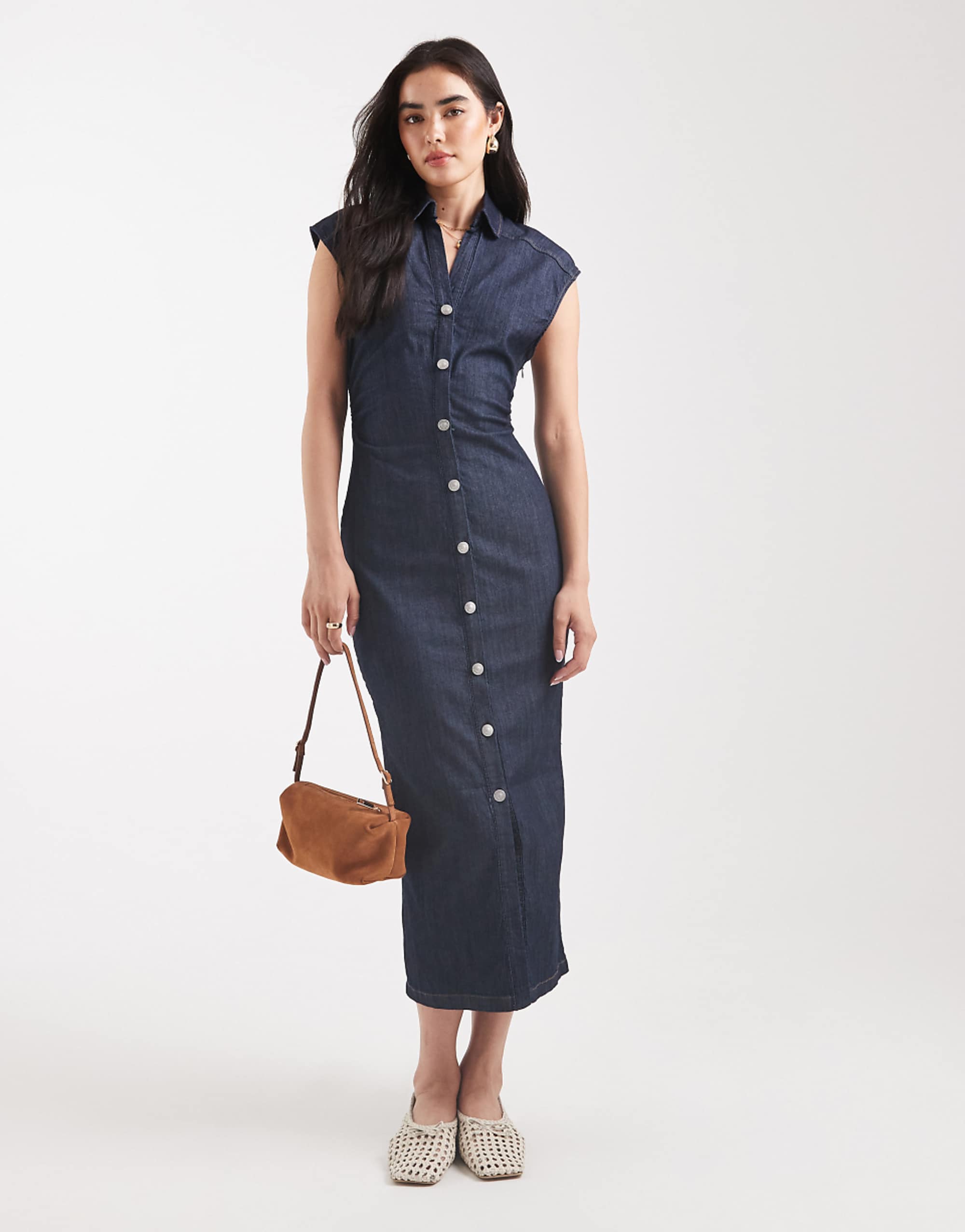 Only worn through the dark blue denim miti dress
