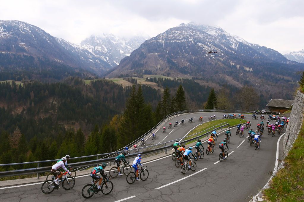 LIENZ AUSTRIA APRIL 21 A general view of Lilian Calmejane of France and AG2R Citroen Team Cian Uijtdebroeks of Belgium and Team Bora Hansgrohe Lenny Martinez of France and Team Groupama FDJ and the peloton passing through Kartitscher Sattel 1524m mountain landscape during the 45th Tour of the Alps 2022 Stage 4 a 1424km stage from Villabassa to Kals am Grossglockner 1336m TouroftheAlps on April 21 2022 in Lienz Austria Photo by Tim de WaeleGetty Images