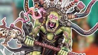 An Ork Weirdboy models yells, while surrounded by a white outline