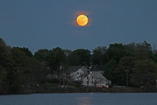 Supermoon of 2012 as seen by photographers Imelda Joson and Edwin Aguirre from Woburn, Mass., on May 5, 2012.