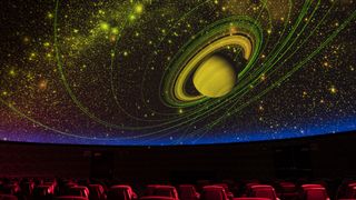 Saturn on the ceiling of the ʻImiloa Planetarium.