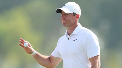 Rory McIlroy salutes the crowd after holing a putt