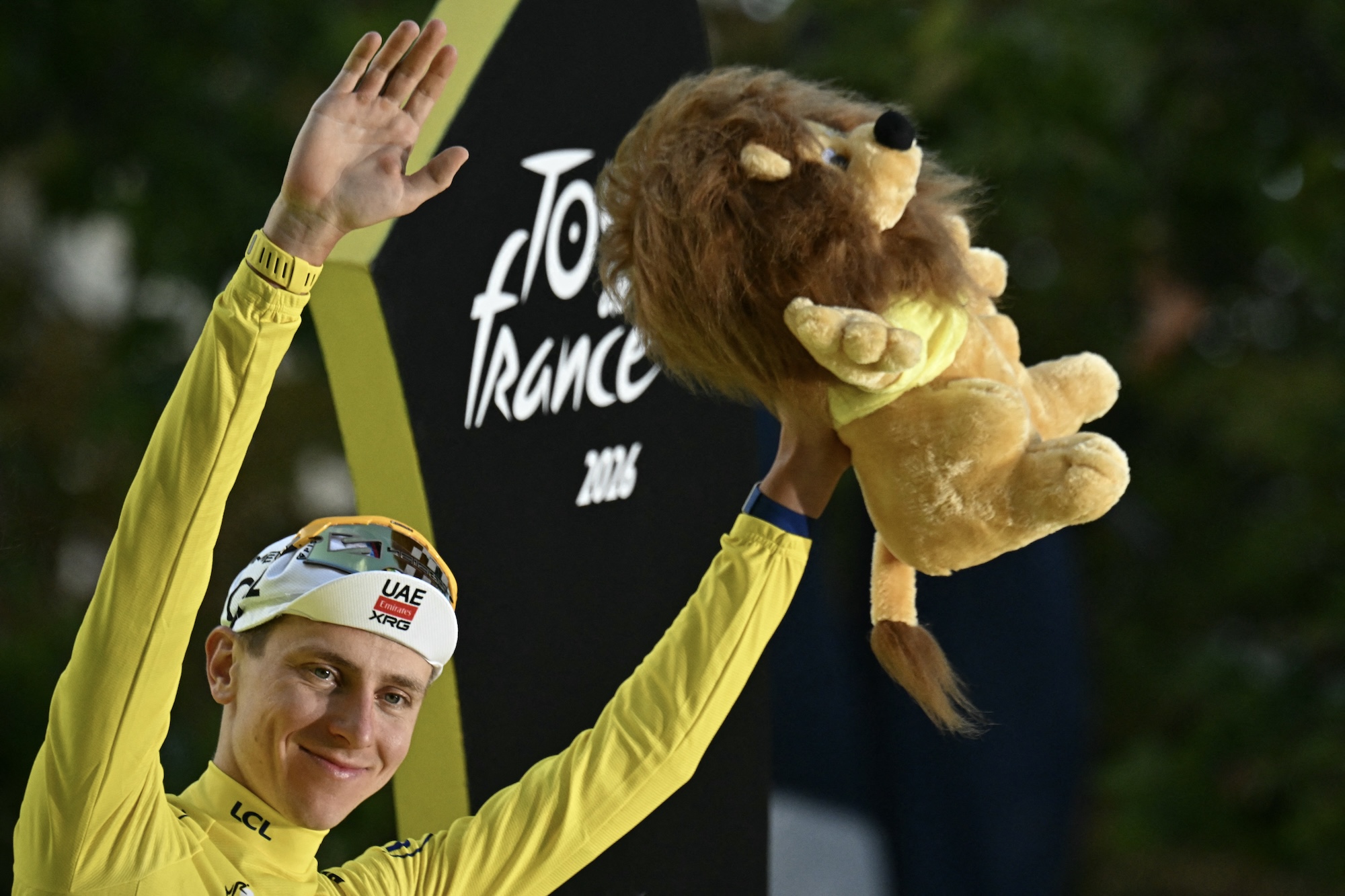 ‘I’m not thinking about any history, clubbing, or whatever' - Tour de France winner Tadej Pogačar has his name in lights but keeps his feet on the ground