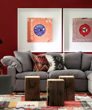 Gray sofa in dark red living room