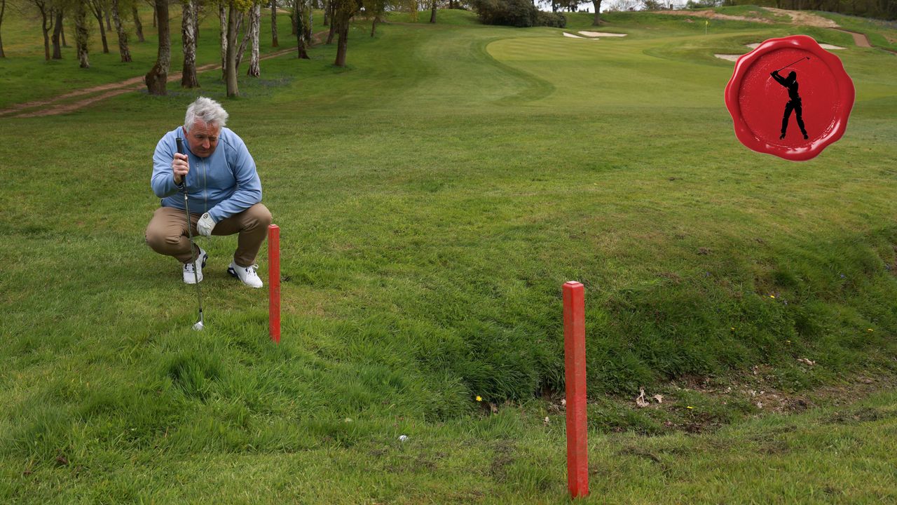 a golfer looking at two red stakes near a penalty area