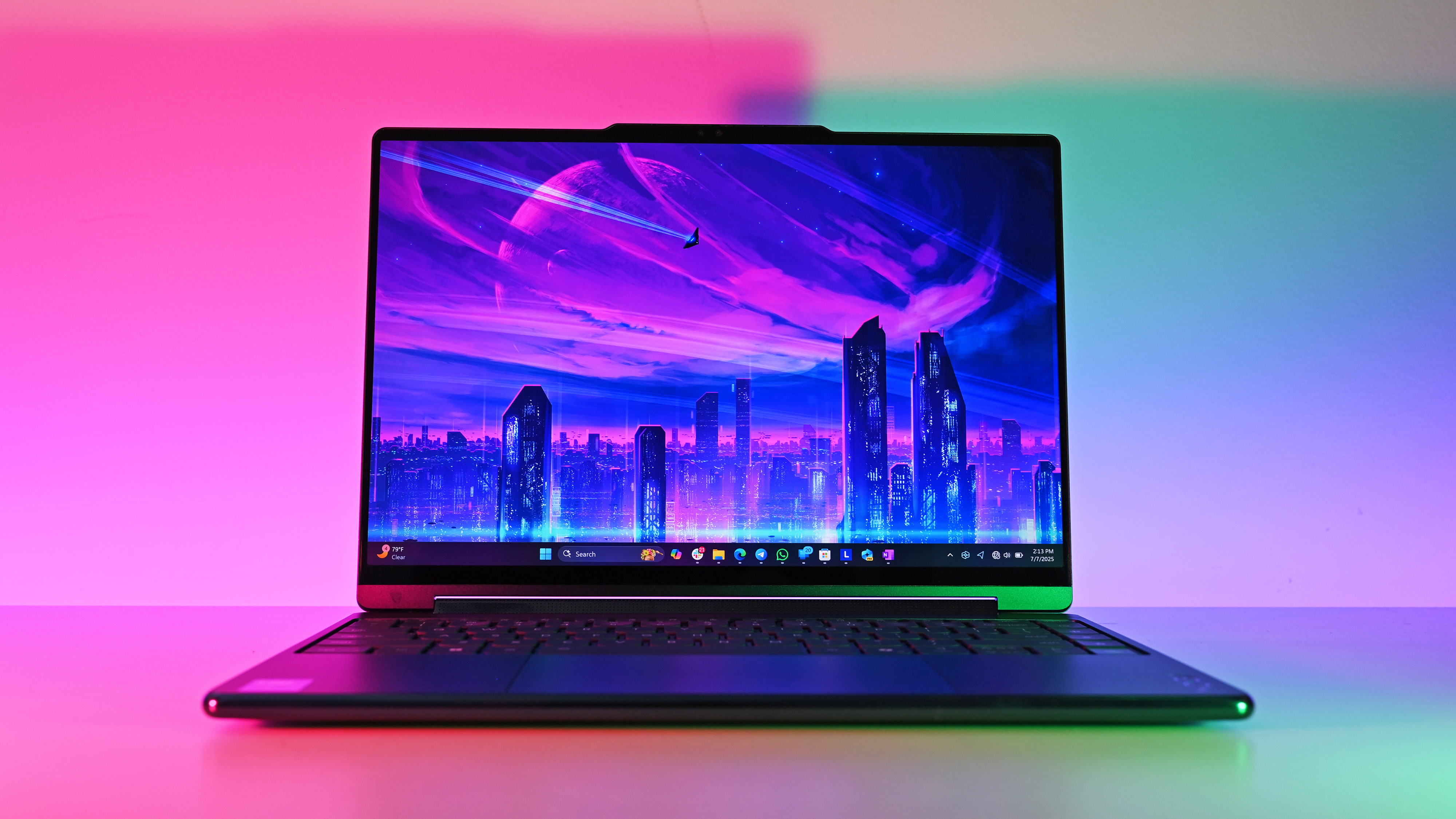 Photos of the Lenovo Yoga 9i 2-in-1 (2025) Intel Aura Edition 14-inch laptop.