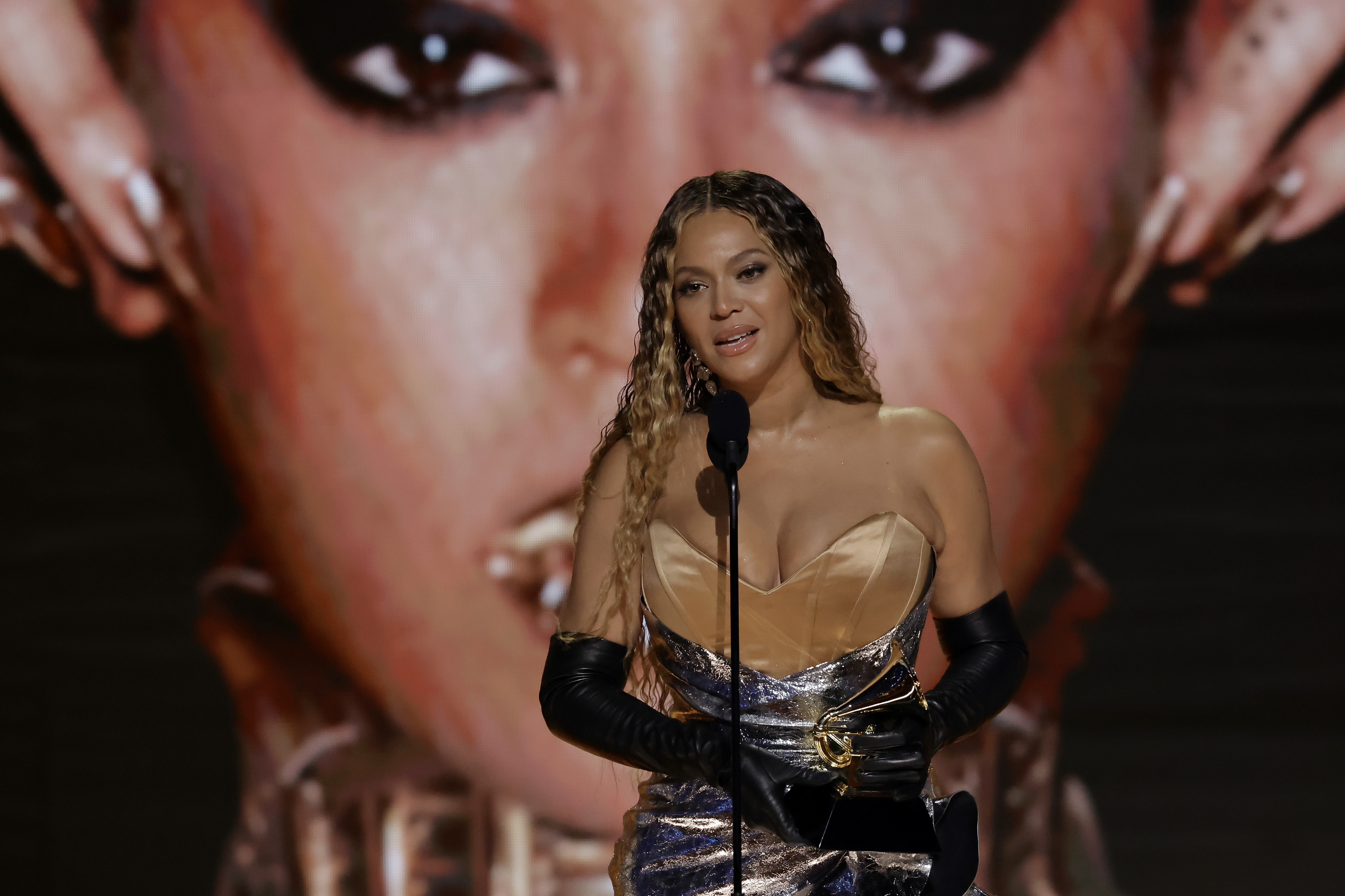 Beyonce accepting an award on stage