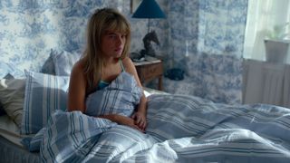 Alva Brat as Lollo Millkvist in bed in Barracuda Queens