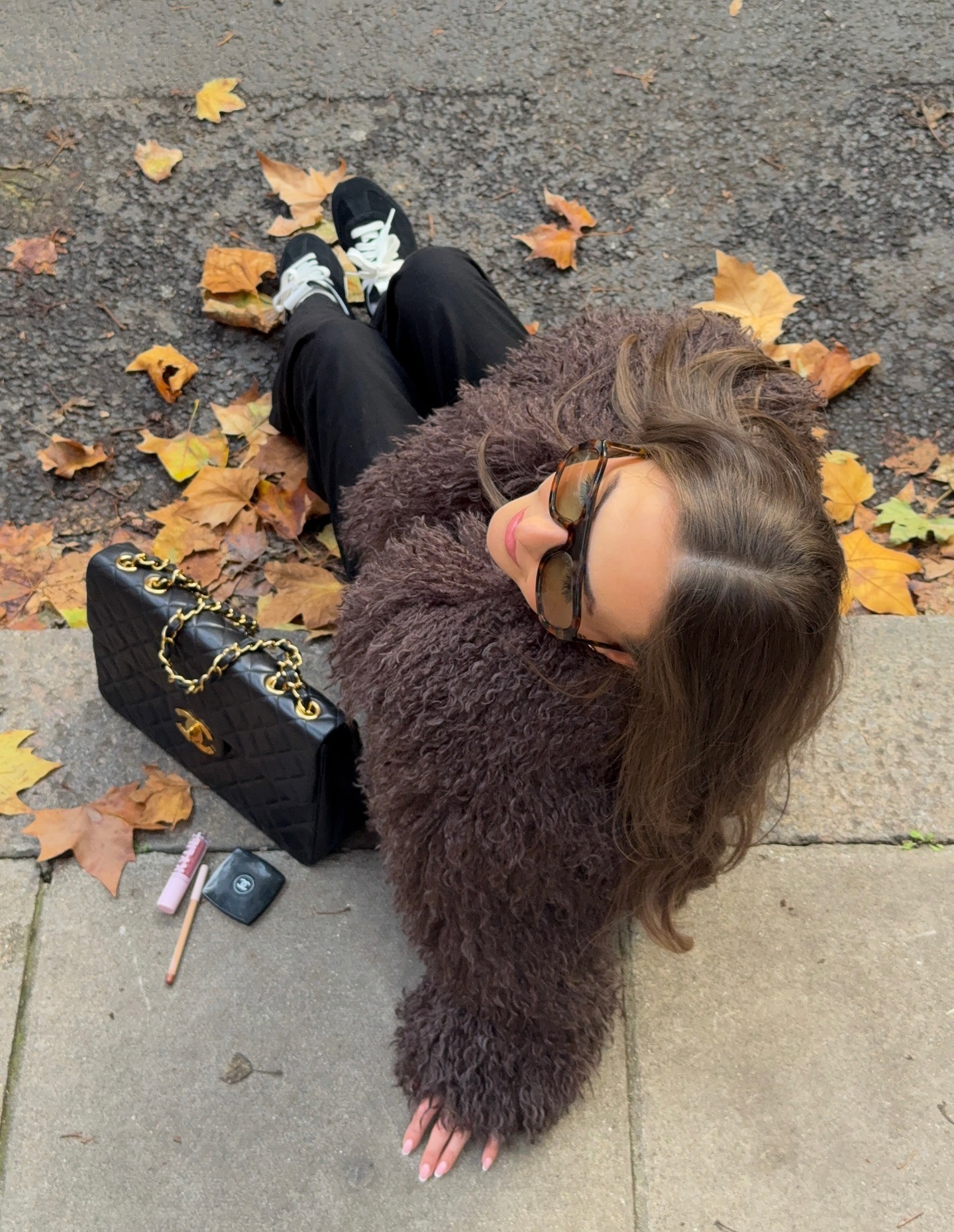 Fashion person Nicole wears a faux fur jacket outfit.