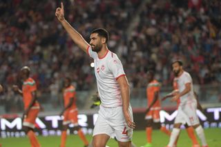 Yassine Meriah celebrates after scoring for Tunisia against Niger in October 2018.