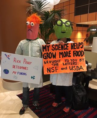 A nuclear physicist and his entomologist wife dressed up as the muppets Beaker and Bunsen for the March for Science in Washington, D.C.