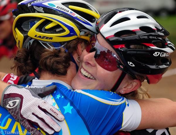 Former teammate Georgia Gould congratulates Chloe Forsman on her first pro victory.