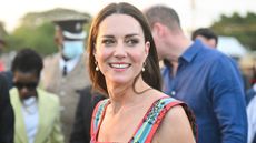 Catherine, Princess of Wales smiles as she arrives in Trench Town in 2022