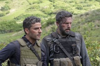 Oscar Isaac and Ben Affleck are in war fatigues in Triple Frontier