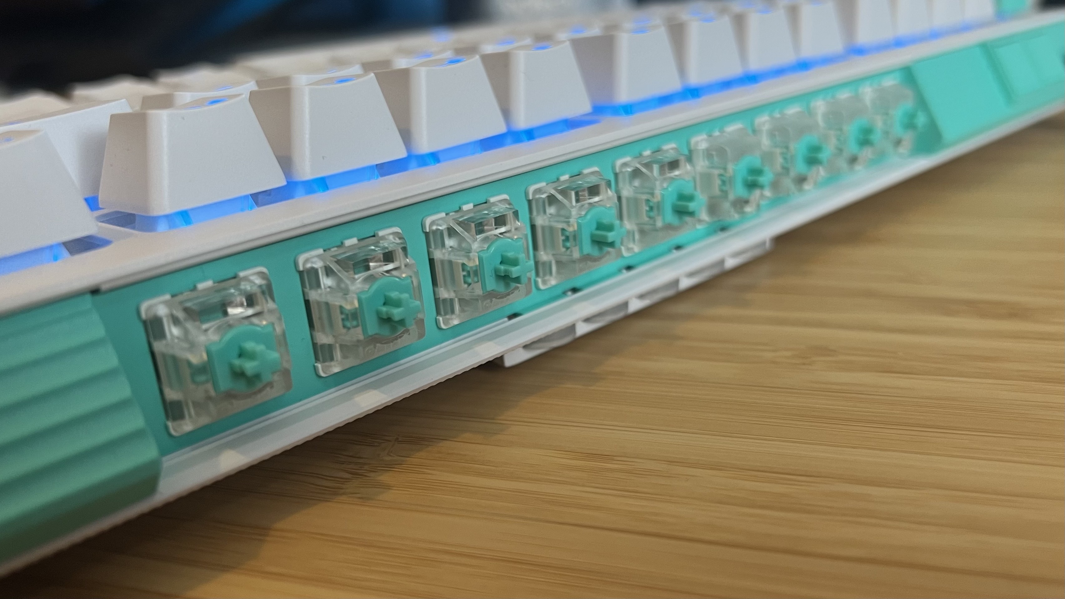 Close up on extra Gateron switches provided at the top border of the Logitech G512 X keyboard