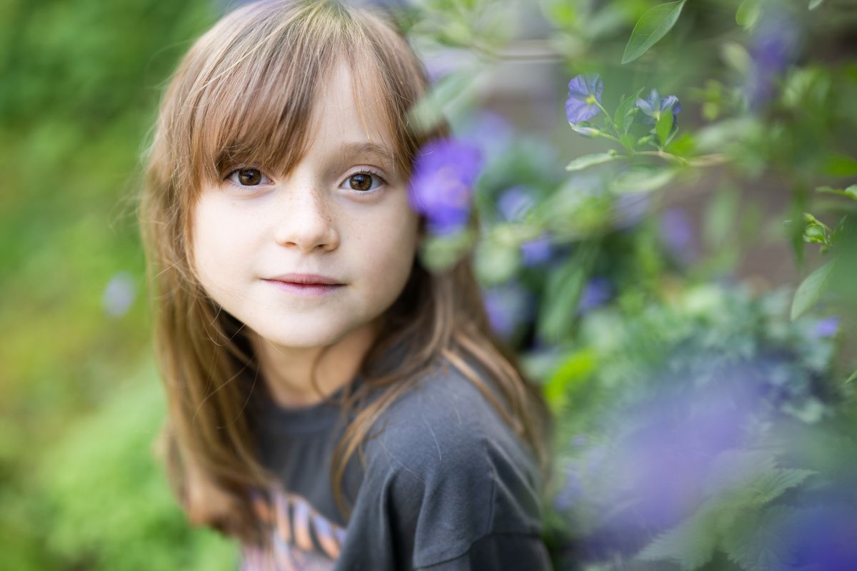 Portrait of girl in garden shot with Nikon Z 50mm f/1.2 S at f/1.2