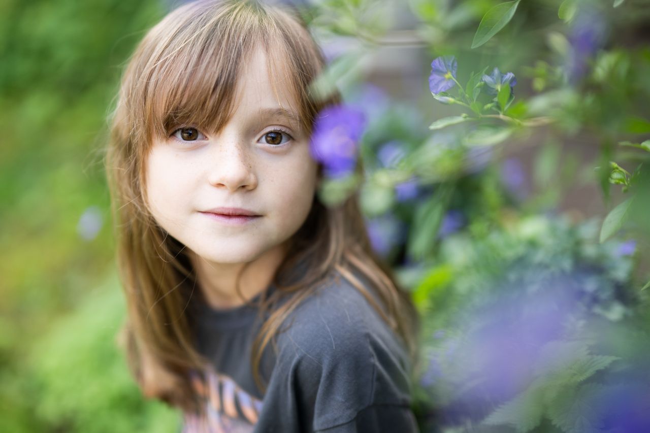 Portrait of girl in garden shot with Nikon Z 50mm f/1.2 S at f/1.2