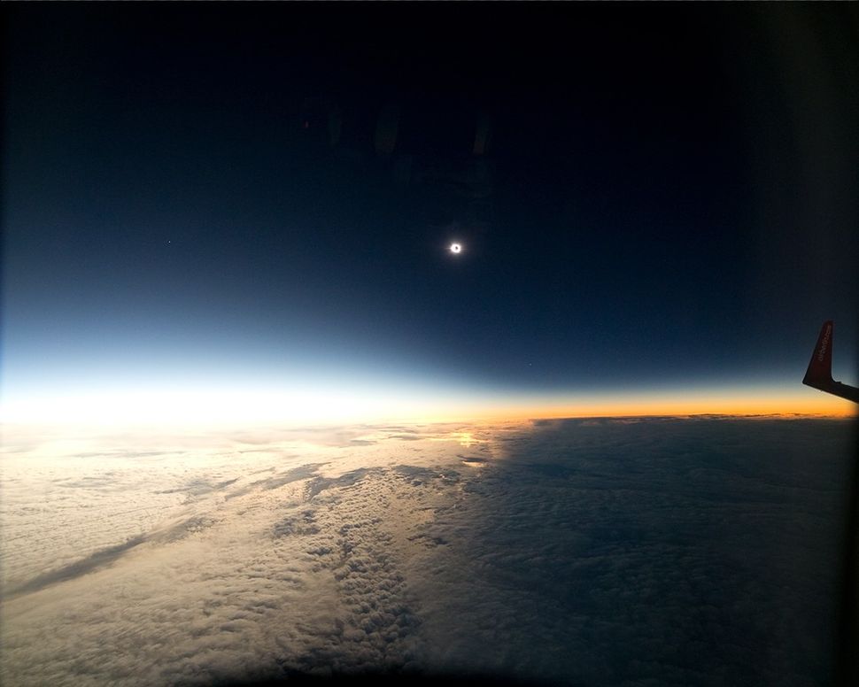 What It's Like Watching a Solar Eclipse From a Plane Space