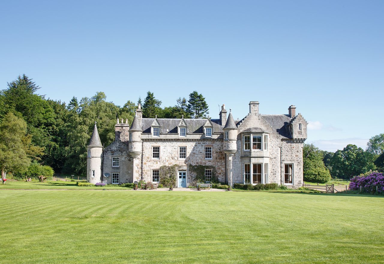 exterior of castle with grass lawn