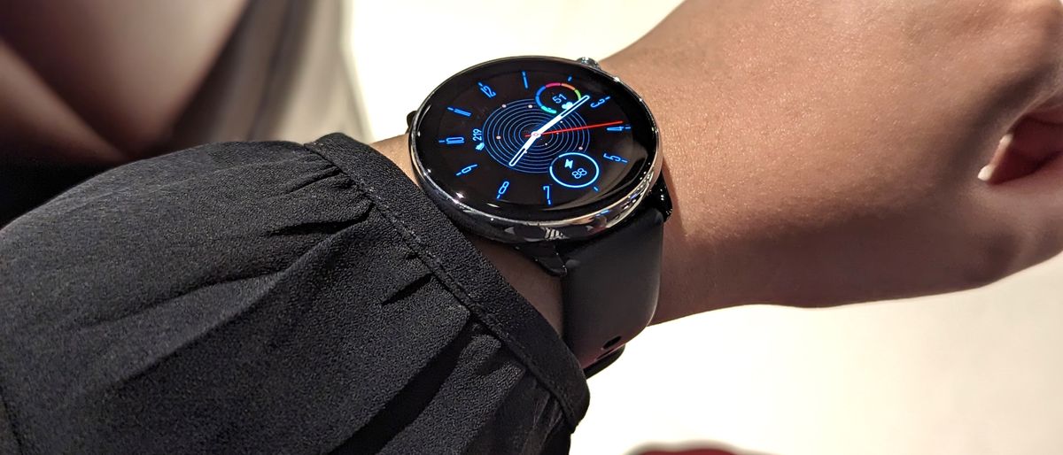 Amazfit GTR Mini smartwatch worn on a wrist, showcasing the basic watch face.