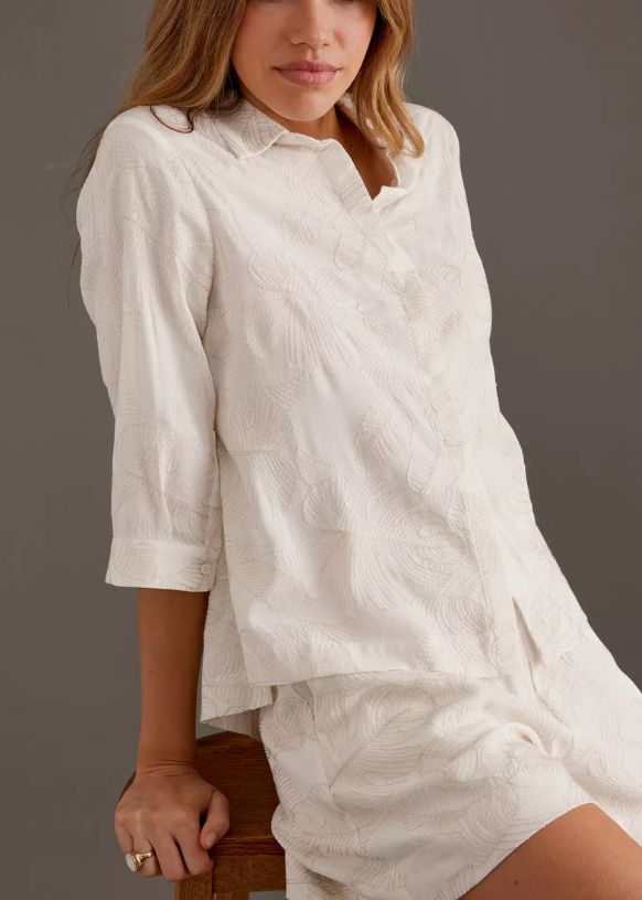 Image of woman wearing short shirt
