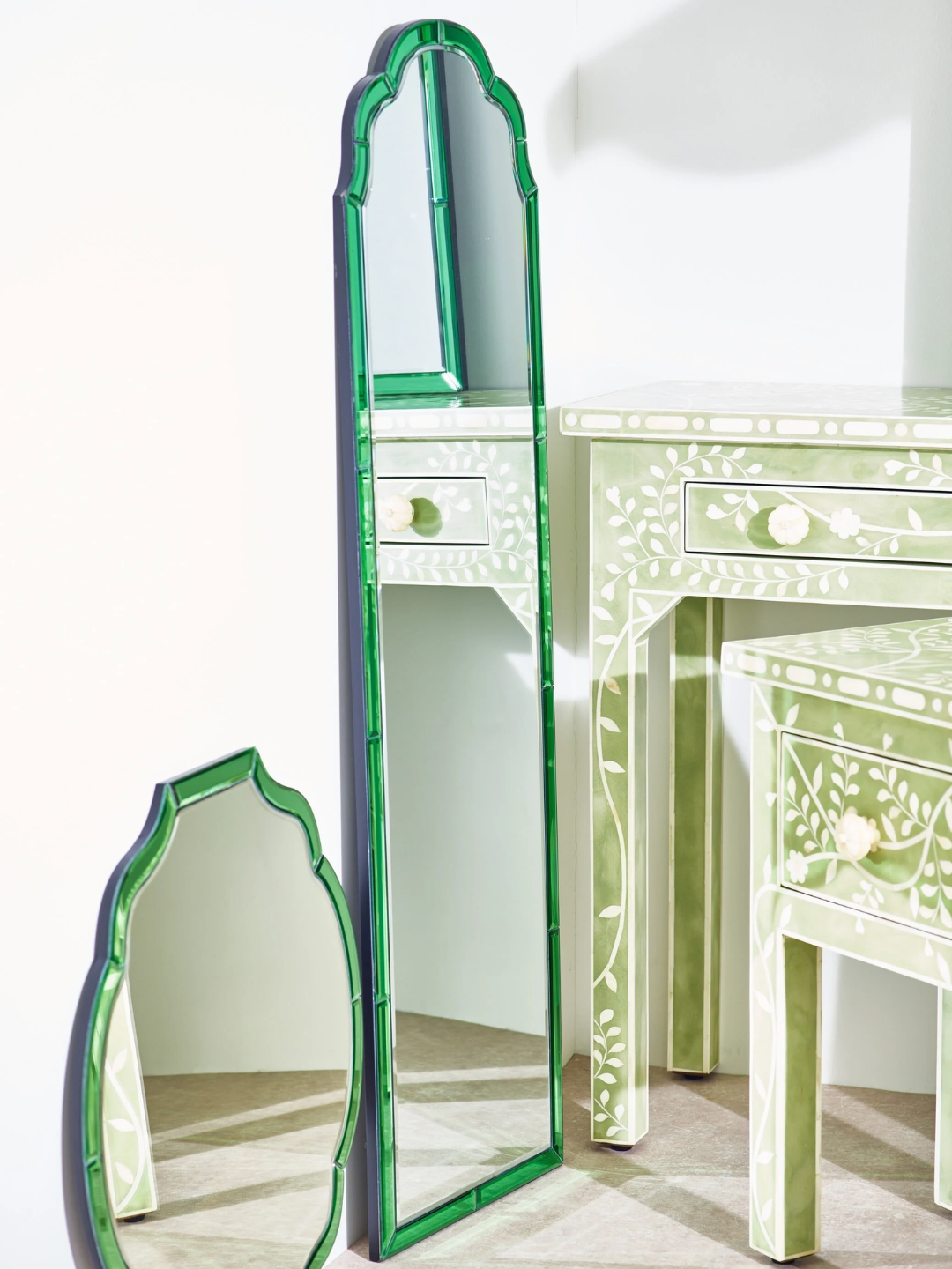 An art deco green mirror from Oliver Bonas