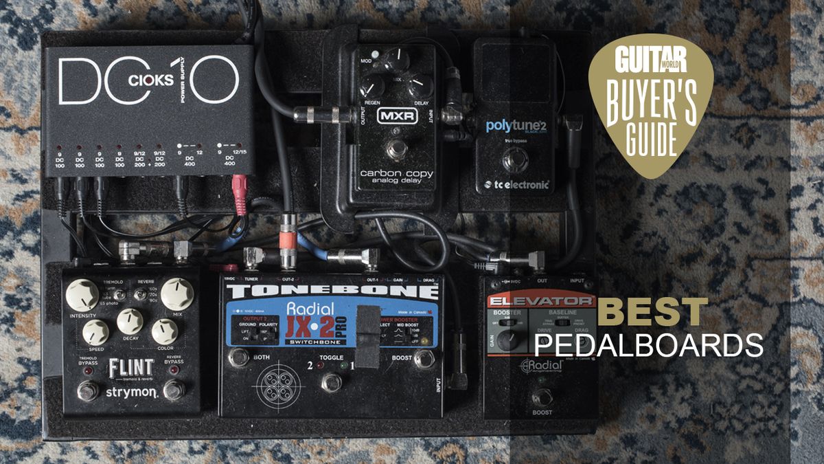 A pedalboard lying on a carpet