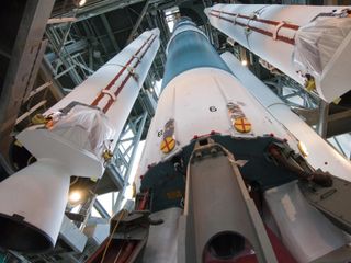 At Cape Canaveral Air Force Station's Space Launch Complex 17B, solid-fueled boosters are prepared for attachment to the first stage of the Delta II rocket that will launch the GRAIL twin spacecraft.