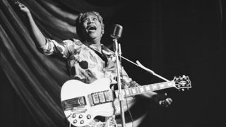 Sister Rosetta Tharpe (1915 - 1973) performs at a Blues and Gospel Caravan tour in the UK, 1964.