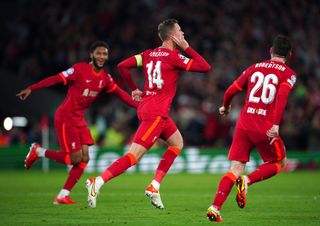 Jordan Henderson (centre) celebrates scoring Liverpool's winner