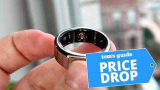 Oura Ring 3 held in hand