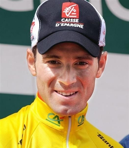 Valverde smiles on the podium as he continues to lead the overall.