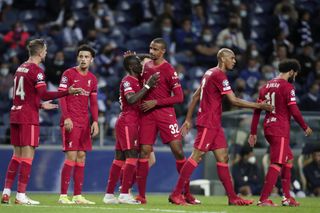 Sadio Mane (third left) celebrates scoring for Liverpool