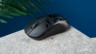 A black Keychron M3 Mini 4K Metal wireless gaming mouse