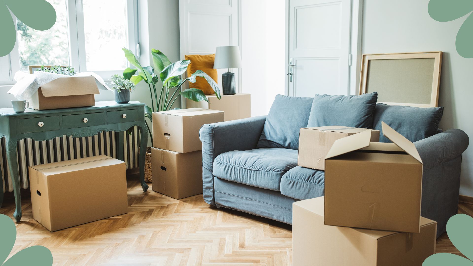 picture of living room with moving boxes dotted around the room