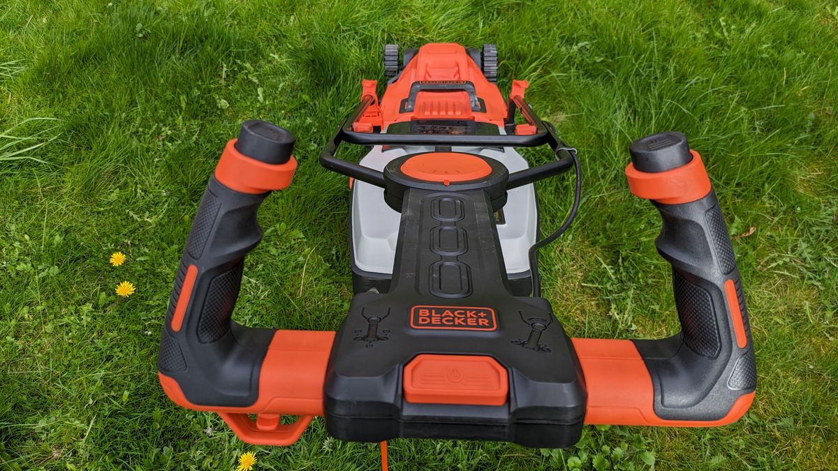Both the US and UK versions of Black + Decker's mower have upright handles, although the steering mechanisms work slightly differently.