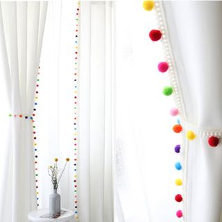 white with multicolored pom pom blackout curtains
