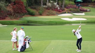 Anna Davis plays her tee shot on the 12th hole at Augusta
