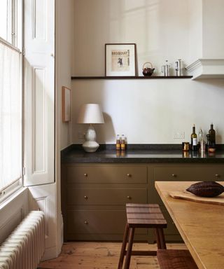 Brown deVOL kitchen with white walls