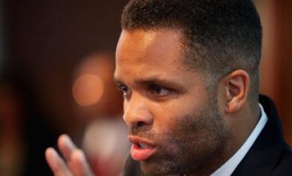 Rep. Jesse Jackson Jr. (D-Ill.) speaks at a town hall meeting in Chicago in 2009: Jackson has been under investigation by the federal government for alleged money misuse.