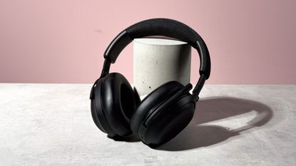 The Final VR3000 EX for Gaming unfolded and leant against a stone and concrete cylinder.