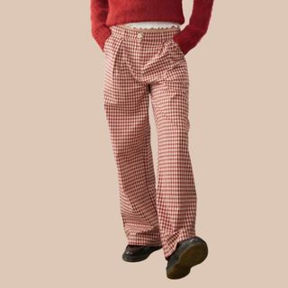 flat lay image of red plaid trousers