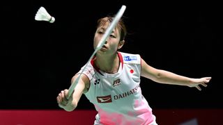 Japan's Nozomi Okuhara returns the shuttlecock to India's Pusarla Venkata Sindhu during their women's singles final match at the BWF Badminton World Championships