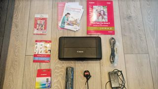 Canon PIXMA TR150 Wireless Inkjet Printer being tested in writer's home