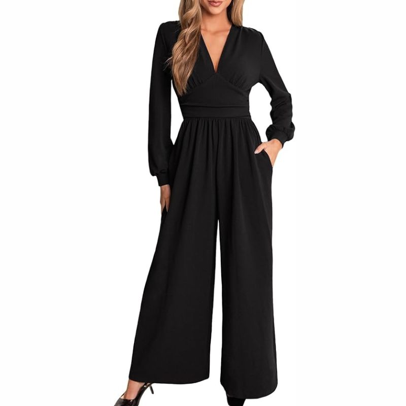 A woman wears a black v-neck wide leg jumpsuit