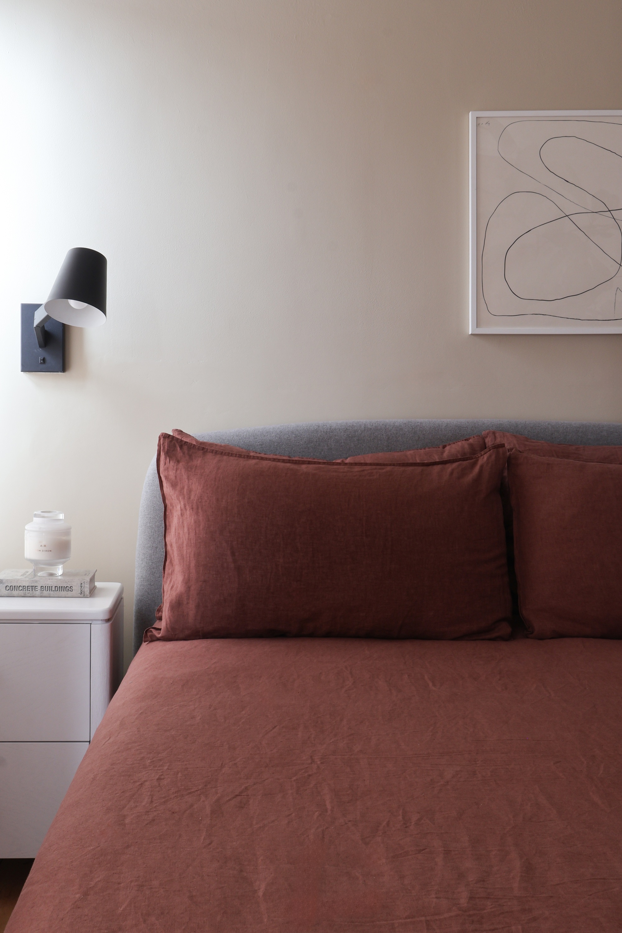 M&s red linen bedding on a bed in a bedroom