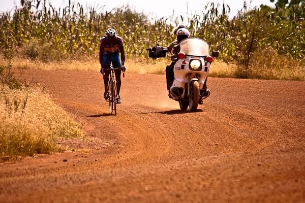 A Malian rider rounds a bend near the end of stage 9.