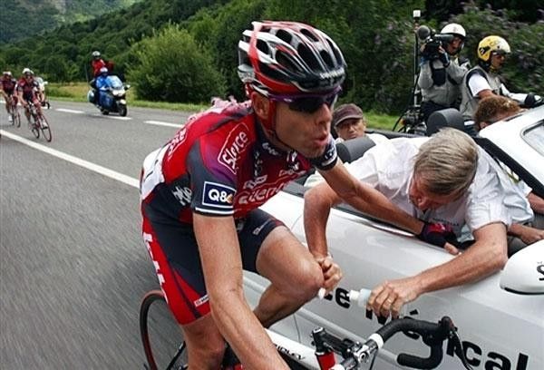 Evans feels the pain as the doc applies the disinfectant.